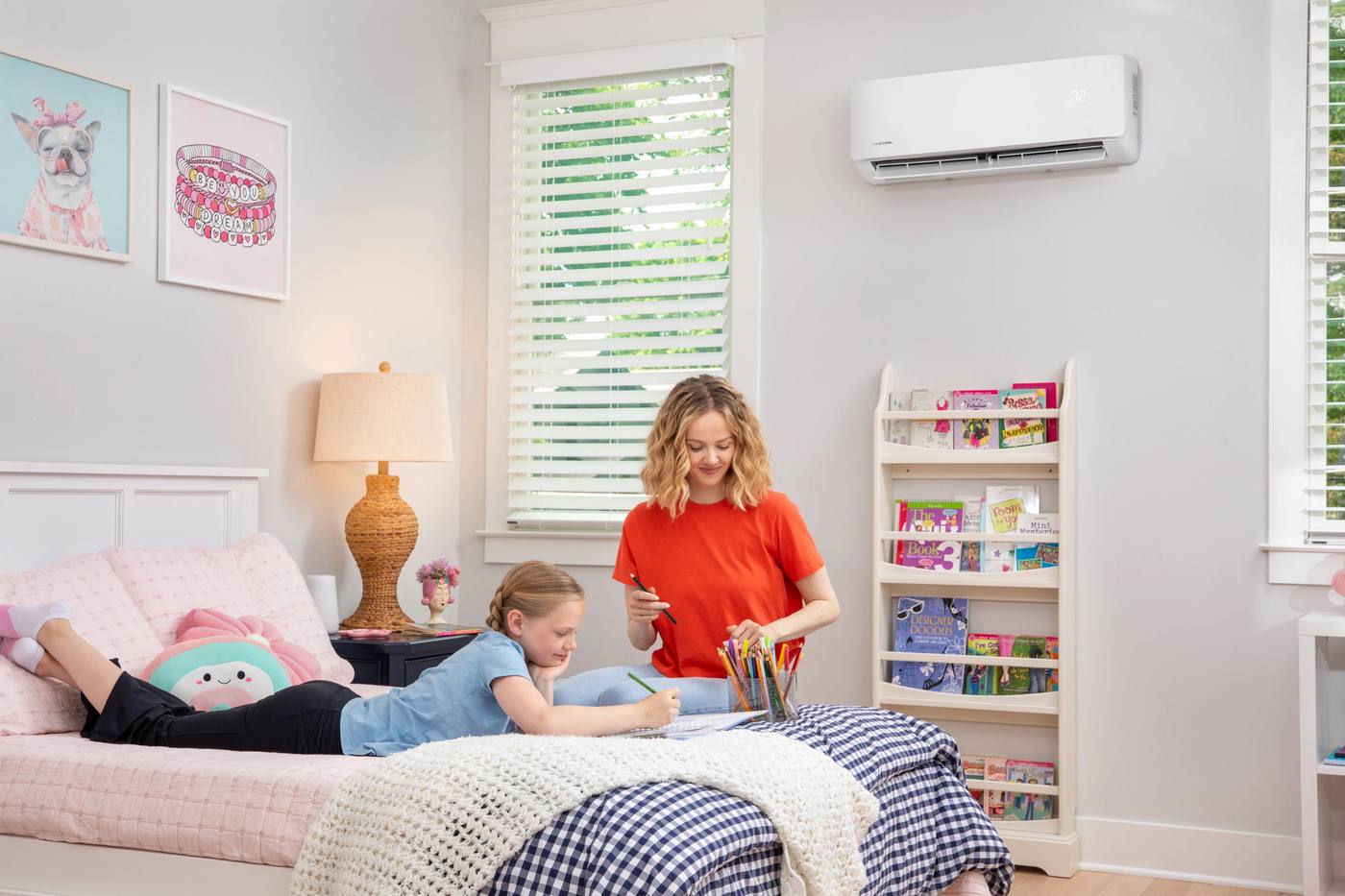 MRCOOL wall-mounted mini-split installed above a bookshelf in a bedroom