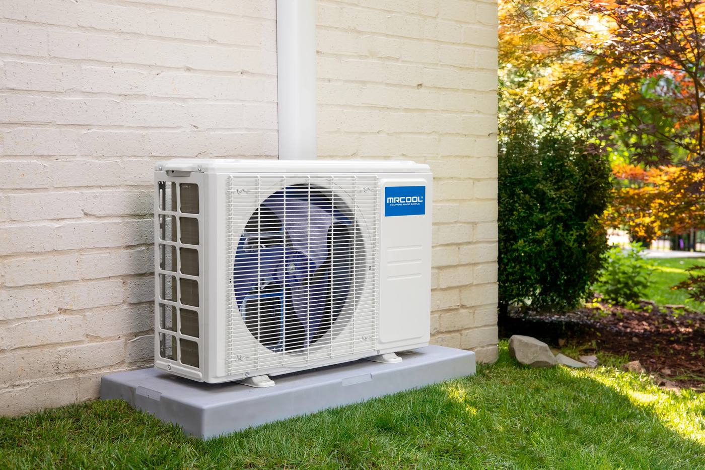 MRCOOL outdoor condenser unit installed beside a house